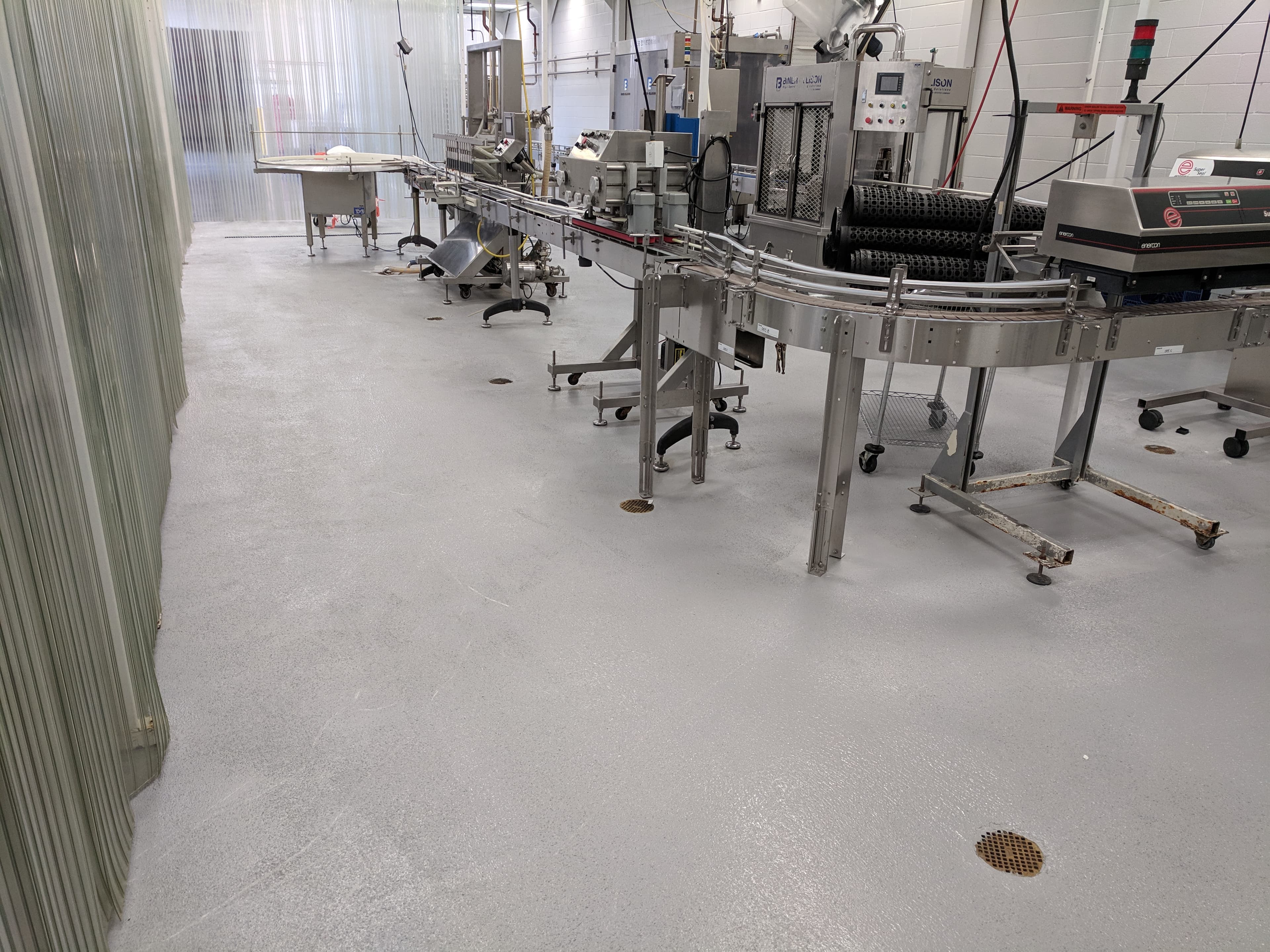 Bella Rocca commercial aggregate floor in a food-production facility