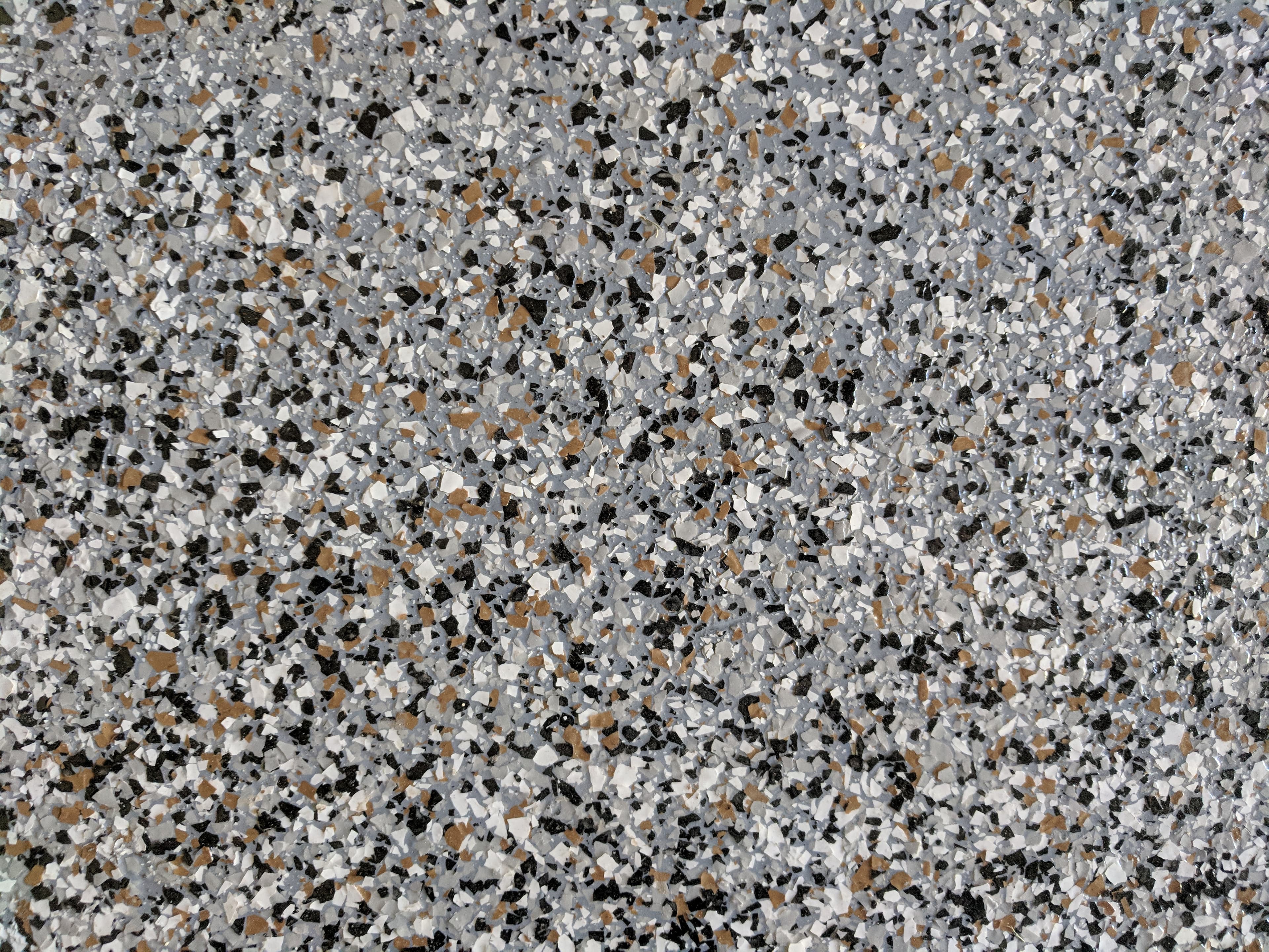 Close-up detail of a Bella Rocca full-flake floor system