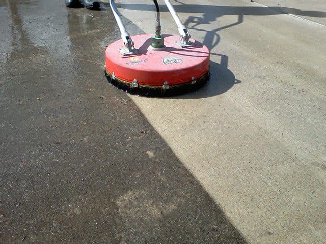 Concrete surface being cleaned as part of Bella Rocca surface preparation